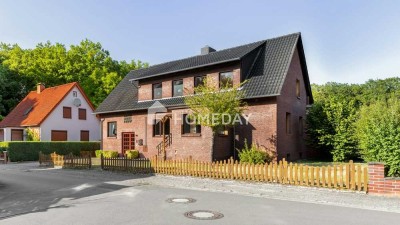 Naturnahes Wohnen: Attraktives Ein- bis Zweifamilienhaus mit großem Grundstück, Garage und Werkstatt