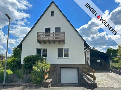 Perfektes Zuhause für junge Familien: Charmantes Einfamilienhaus mit Garten und Carport!