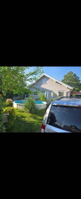 12min. von Wien ist ein modernes 4.5-Zimmer Einfamilienhaus mit Panoramafenster, Pool und Garten in Deutsch-Wagram(perfekte Infrastruktur) zu haben