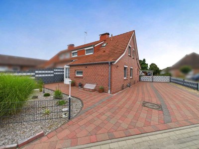 Wohlfühltraum – Modernisierte Doppelhaushälfte mit Kamin, Sommergarten und Wohnmobilstellplatz