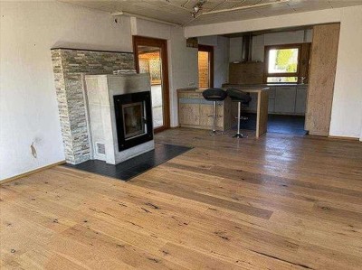4 Zimmer Erdgeschosswohnung mit Wintergarten und Garten