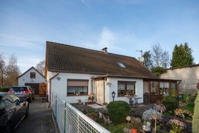 Listenpreis 130.000,00 € - Einfamilienhaus in Alt Kosenow, mit Wintergarten, Garage und Nebengelass