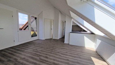 Schöne 2,5 Zimmer Dachgeschosswohnung in Top Lage von Ditzingen mit TG Stellplatz