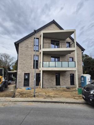 NEUBAU/ ERSTBEZUG, Kaa-Büttgen, 2-Zi-Whg m. off. Küche, Diele, Duschbad, Blk, HWR, Whfl. ca. 71m²