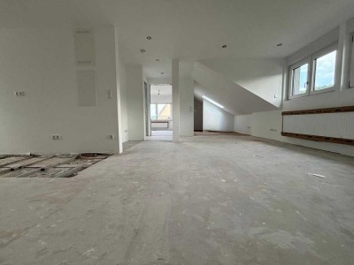 Erstbezug nach Kernsanierung - frisch sanierte Dachgeschosswohnung mit zwei Gauben