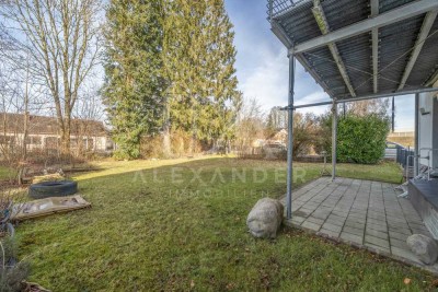 Charmante, ruhige 3-Zimmer-Wohnung mit großzügigem Garten, Hobbyraum & Garage in Unterföhring!