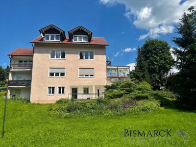 Attraktives Mehrfamilienhaus mit großem Baugrundstück