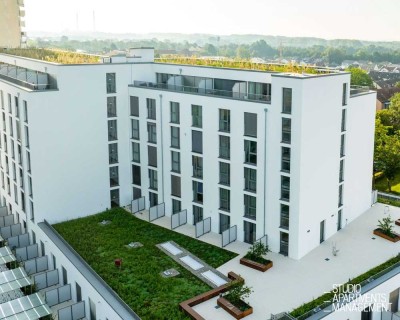 DONAU SIDE: Modernes Penthaus-Apartment mit Dachterrasse, Fitnessstudio & Co-Working