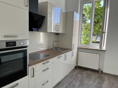 Erdgeschosswohnung mit Terrasse in zentraler Lage von Röhrmoos