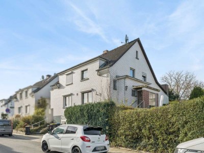 Charmante Doppelhaushälfte mit Garten, Kaminofen und Ausbaupotenzial in Velbert-Neviges