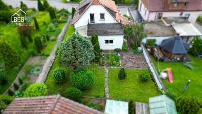 Sanierungsbedürftiges Einfamilienhaus mit schönem Garten