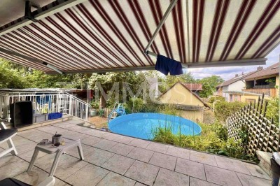 schönes Reihenhaus mit Garten, neuer Heizung und Garage in Erlangen