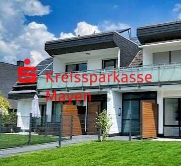 Attraktive Erdgeschoßwohnung mit Terrasse, Balkon und Gartenanteil.