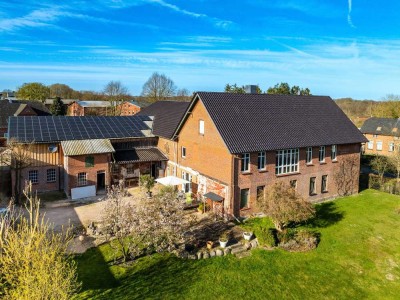 Vielseitiger Resthof in Kükels, Schleswig-Holstein – Ihre Chance auf ländliches Wohnen und Gewerbe!