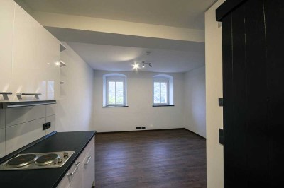 Altstadt-Wohnen am Schlossberg, 1 ZKB im 1. OG in saniertem Baudenkmal