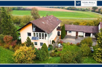 Wohnraum und Landwirtschaft vereint: Mehrfamilienhaus mit Baugrundstück und Ackerflächen