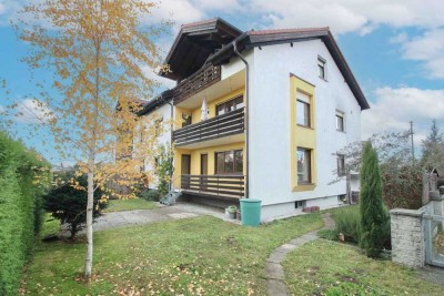 Gepflegte 3-Zi. Hochparterre Wohnung mit eigenem Garten, Einzelgarage und Außenstellplatz