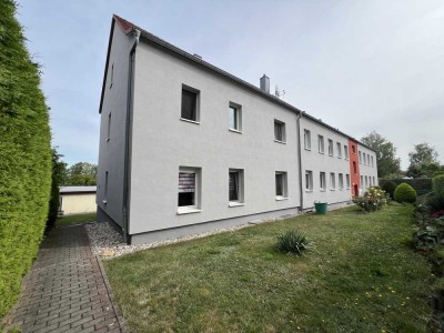Bezugsfrei – 3R Wohnung EG mit Doppelgarage und Pachtgarten