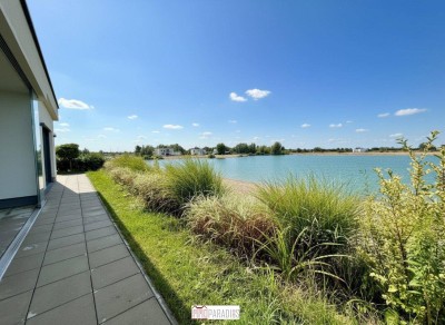 PREISREDUKTION! EXKLUSIVER BUNGALOW AM SEE - ERSTE REIHE MIT TRAUMHAFTEM AUSBLICK