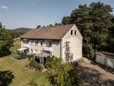 Gepflegtes Mehrfamilienhaus in begehrter Lage mit Bauplatz