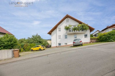 Charmante 2-Zimmer-Souterrainwohnung mit Terrasse, Gartenmitbenutzung und Stellplatz
