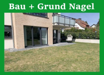 Erdgeschoss-Neubauwohnung mit Terrasse, Garten, Einbauküche etc. in zentraler Lage