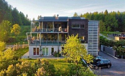 Seltenes Juwel: Haus am Aichwaldsee mit Privatstrand und Bergblick - auch Einzelerwerb der 3 Appartement-Einheiten möglich