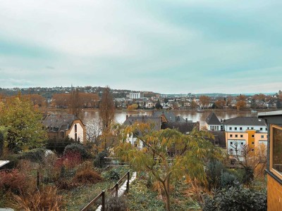 Kleines Einfamilienhaus mit viel Potenzial und tollem Rheinblick