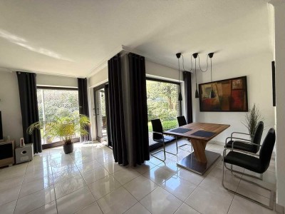 Erdgeschosswohnung mit großem Wohnbereich und Terrasse in Müngersdorf