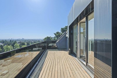 Weitblick: Extravagante Dachgeschosswohnung am Schafberg