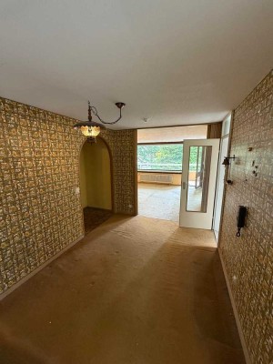 4-Zimmer Wohnung mit Balkon und großem Potenzial!