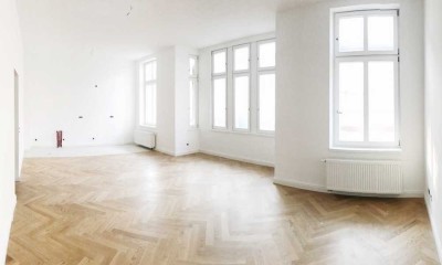 Lichtdurchflutete Altbauwohnung mit Fischgrät-Parkett & Balkon  / Lorettoviertel