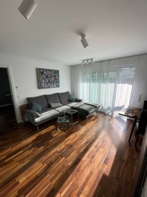 Charmante, luxuriöse Neubau-Wohnung  (2 Zimmer, EBK, Garten, TG) zur Miete im Herzen von Feuerbach!