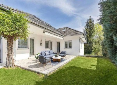 Wohnen wie im Haus: 5-Zimmer-Wohnung mit Terrasse und Garten