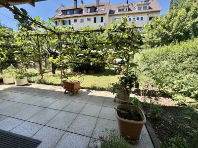 3 Zi.-Hochparterre-Whg., Terrasse, eigener sonniger Garten, EBK, TG-Platz,