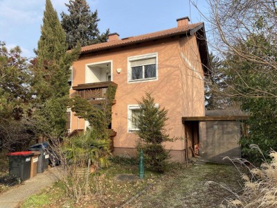 Attraktives Grundstück mit Einfamilienhaus in begehrter Ruhelage