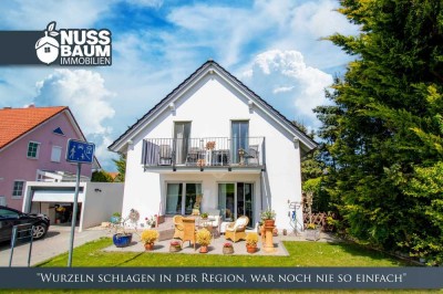 Neuwertiges Einfamilienhaus mit Wärmepumpe, Kamin & Garage in grüner Lage | Meckfeld