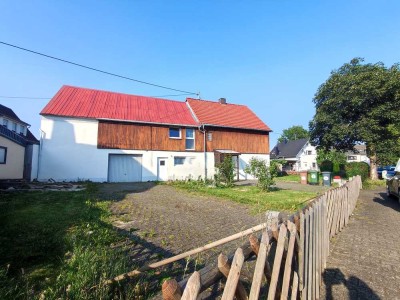 Einfamilienhaus mit großzügiger Scheune und vielseitigen Nutzungsmöglichkeiten in 56459 Guckheim