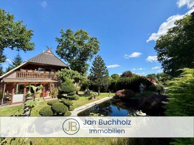 Haus mit vermieteter Wohnung und schönem Garten in begehrter Lage von Buchholz