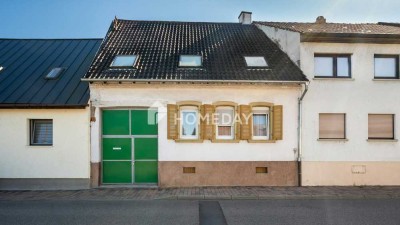 Zwei Wohneinheiten, ein Zuhause: charmantes Reihenhaus mit Anbau und vielseitigem Platzangebot in P