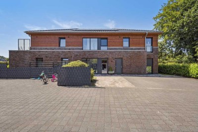 Ansprechende 2-Zimmer-Terrassenwohnung mit gehobener Innenausstattung mit Einbauküche in Sittensen
