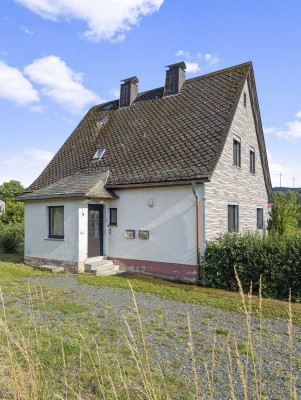 Charmantes Ein- bis Zweifamilienhaus mit großem Garten