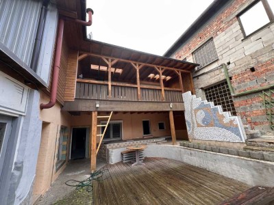 Vermietung von einem Hinterhaus mit eigenem Garten, Werkstatt, Partyraum und große Terrasse