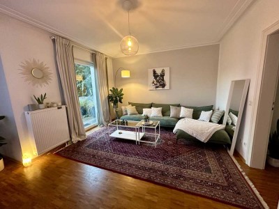 Charmante 2,5-Zimmer Altbauwohnung mit Terrasse, Garten und Garage