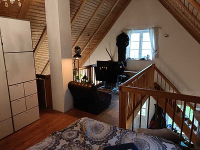 Galerie mit Holzofen