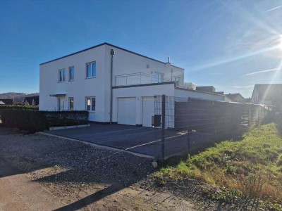Moderne Erdgeschosswohnung mit 5 Zimmern, Wintergarten, Garage und Fußbodenheizung in Borgholzhausen