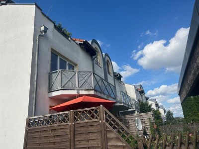 Ruhig gelegene Wohnung mit Einbauküche, Terrasse & Gartenstück!