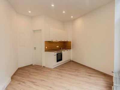 Zentrales Einzimmer-Apartment mit Küchenzeile in der Augsburger Innenstadt zu vermieten!