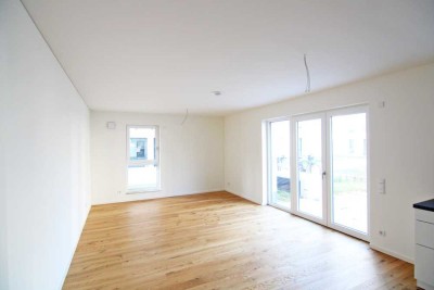 Wohlfühlwohnung im Erstbezug: elegante Ausstattungen, Einbauküche, Terrasse + TG-Stellplatz/Wallbox!