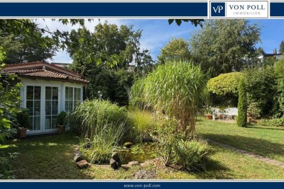 Bungalow mit Pavillon, Carport und Traumgarten...